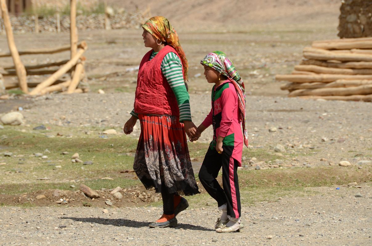 17 Mother Holding Daughters Hand Walking Through Yilik Village On My Trek To K2 China